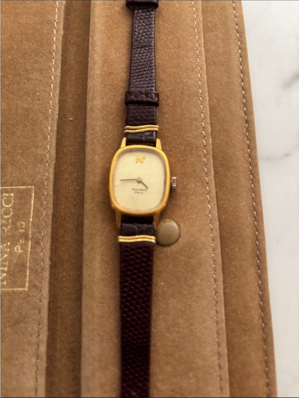 Nina Ricci Gold-Tone Case with Dark Brown Leather Strap Women's Watch